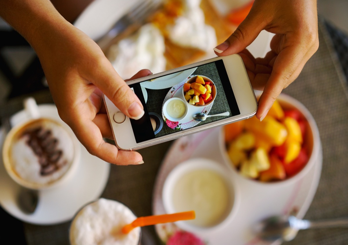 food blogger taking pictures of food