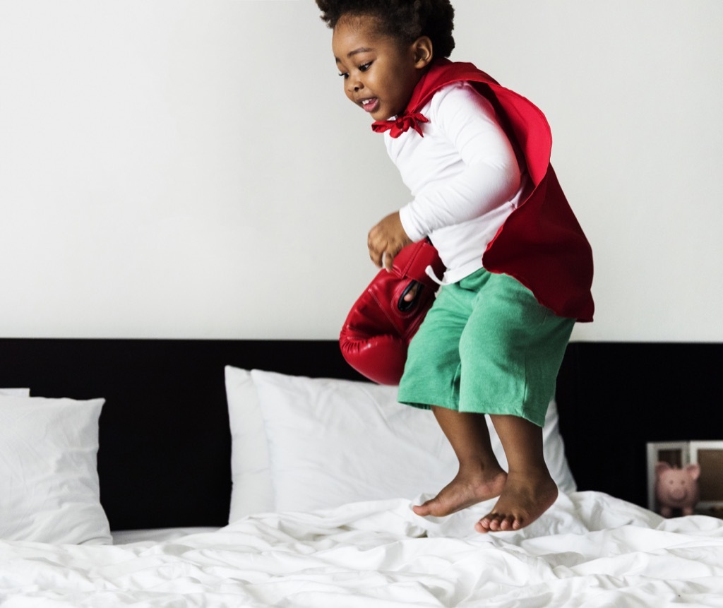 Kid jumping on bed outdated life lessons