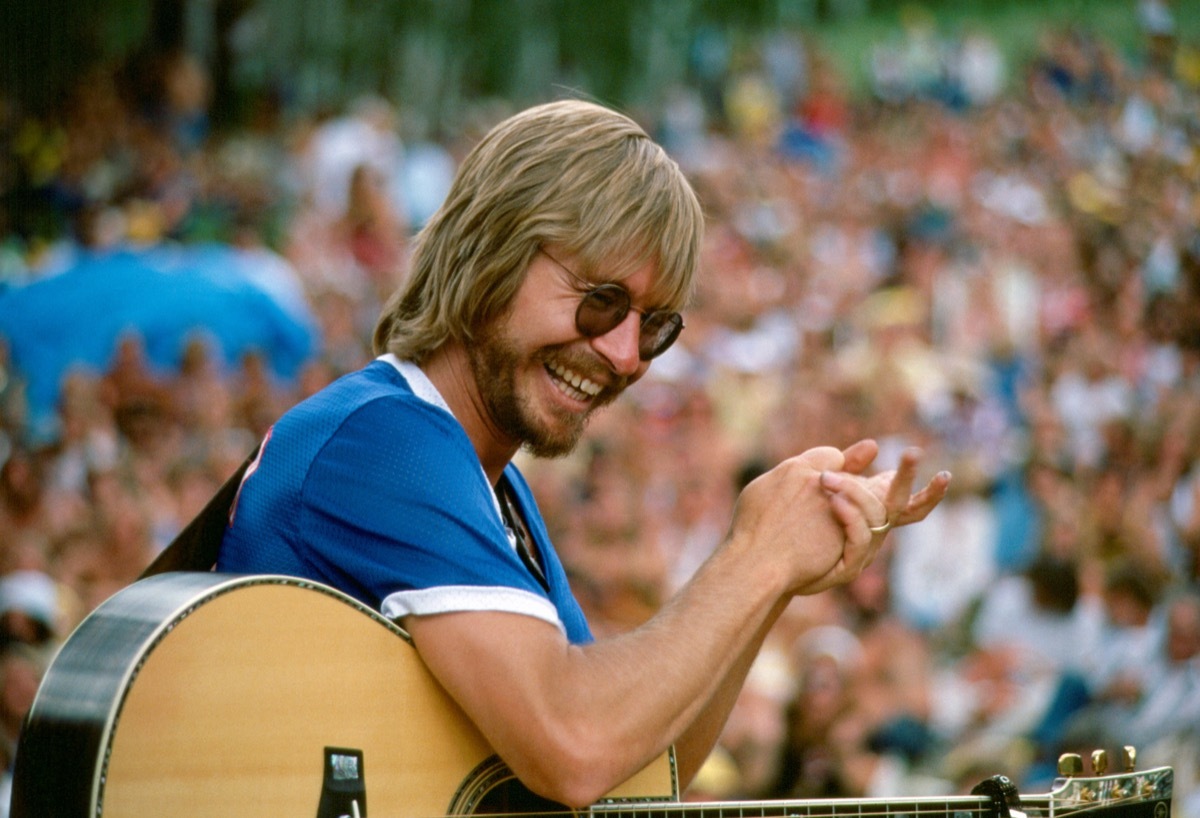 John Denver performing