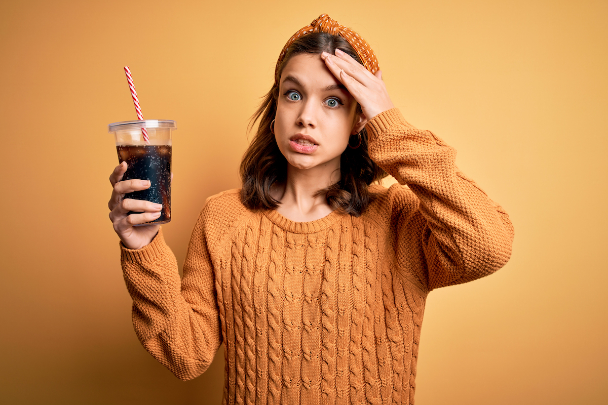 woman drinking soda