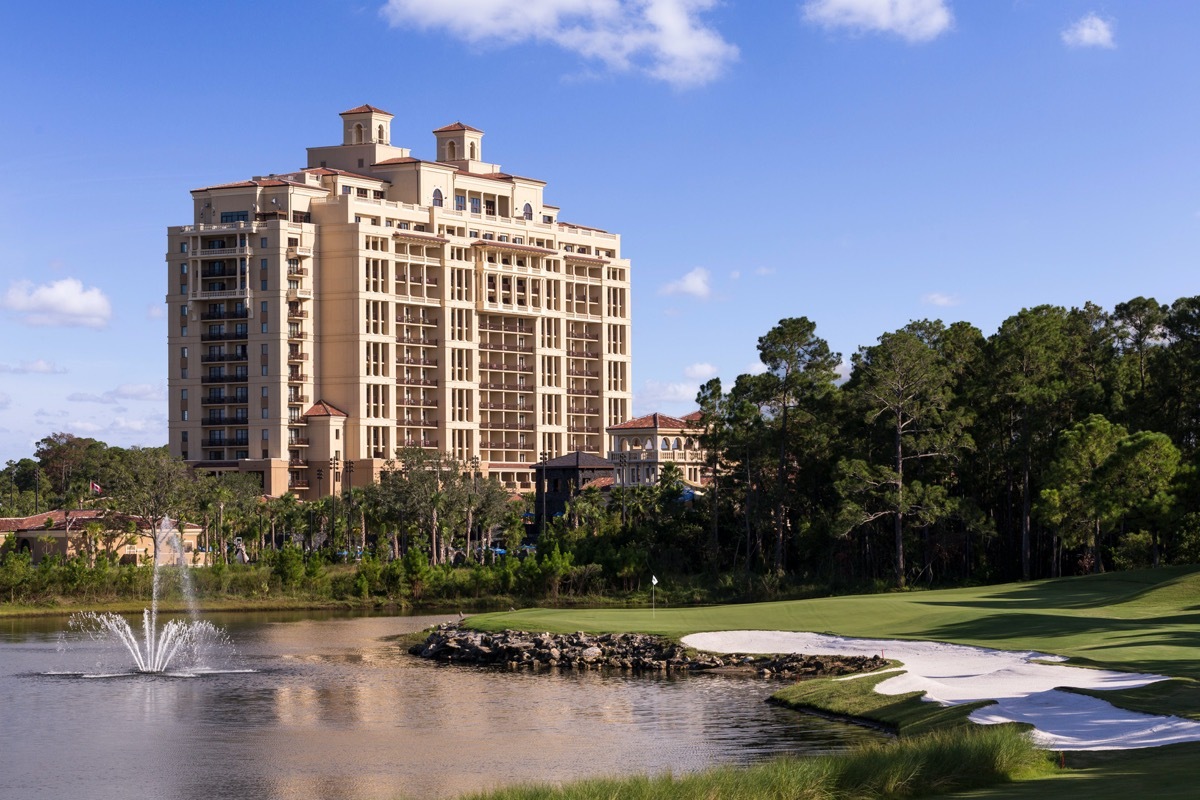 golf course with the four seasons disney resort in the background