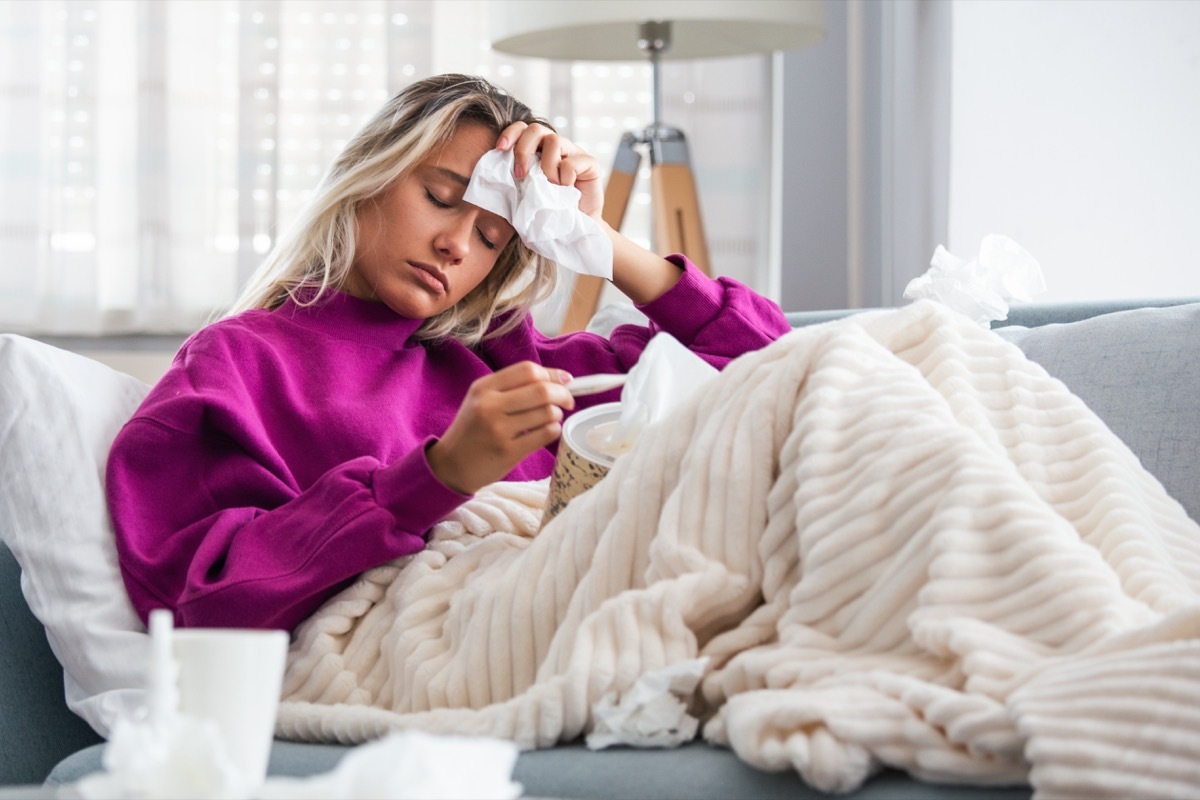 Sick woman on couch