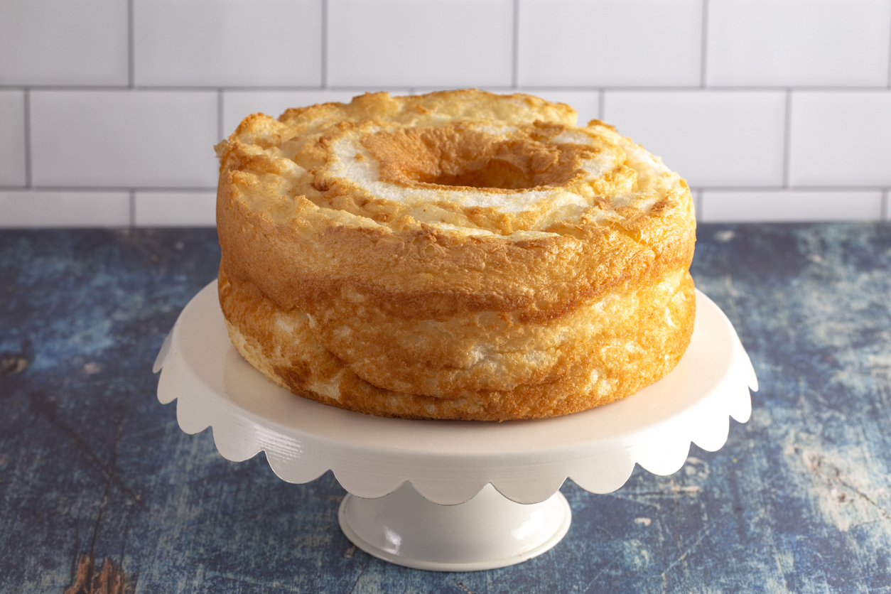 Angel Food Cake On a White Cake Stand