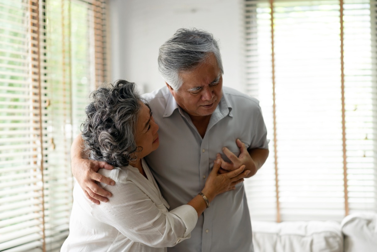 senior male having heart attack.