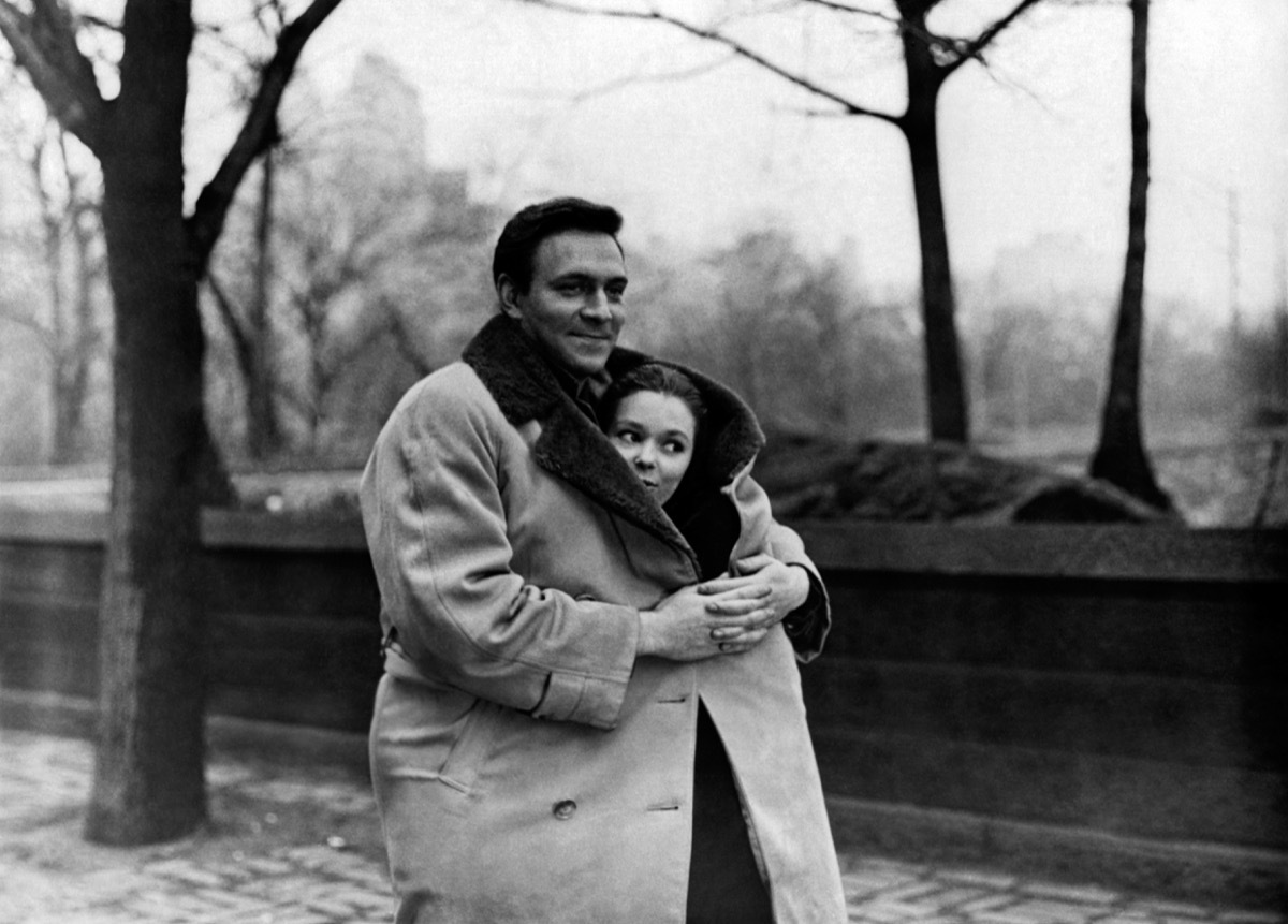 Christopher Plummer wraps Susan Strasberg in his coat