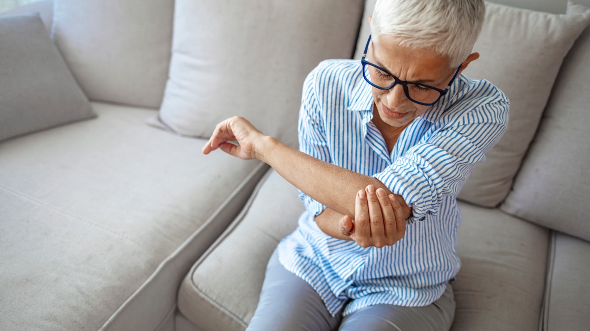 Senior woman with arm pain