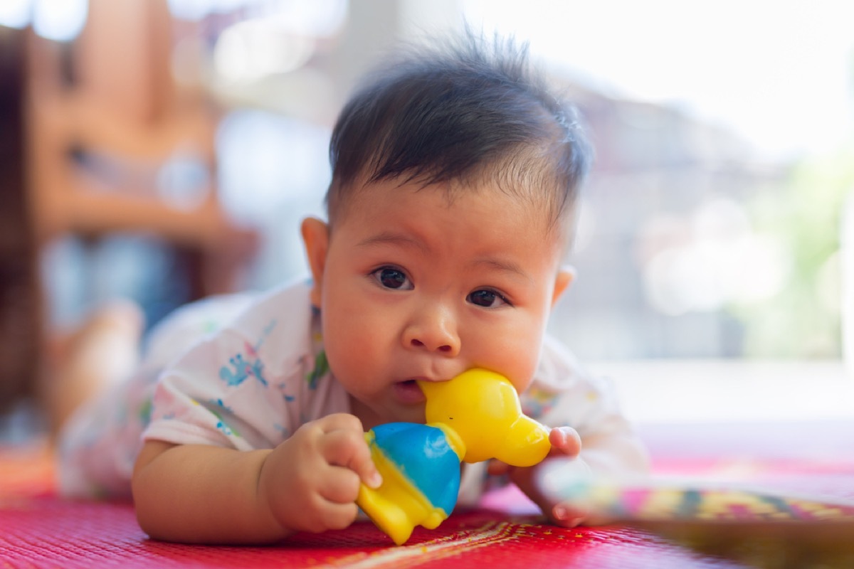 baby chewing on toy, bad parenting advice