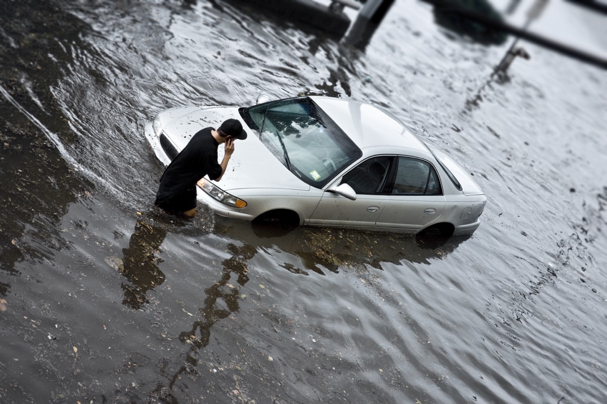 Auto Stuck in Flood Waters.