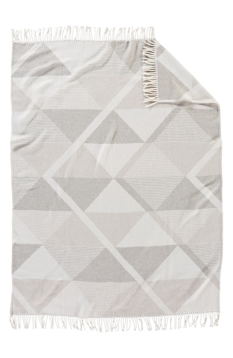 gray blanket with geometric pattern, housewarming gifts