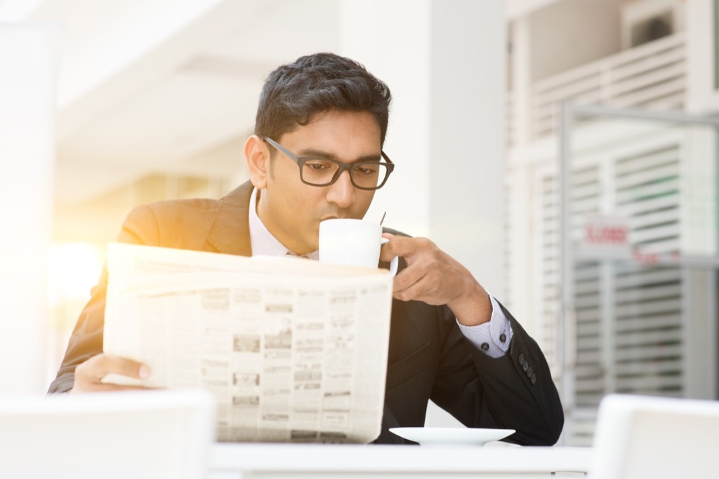 Man Reading the Newspaper {Smart Shopping Habits}