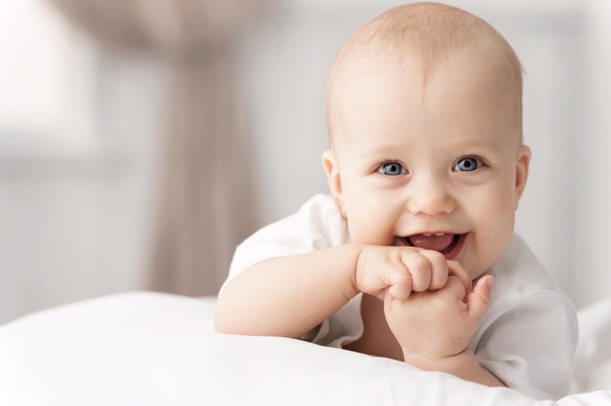 white baby smiling