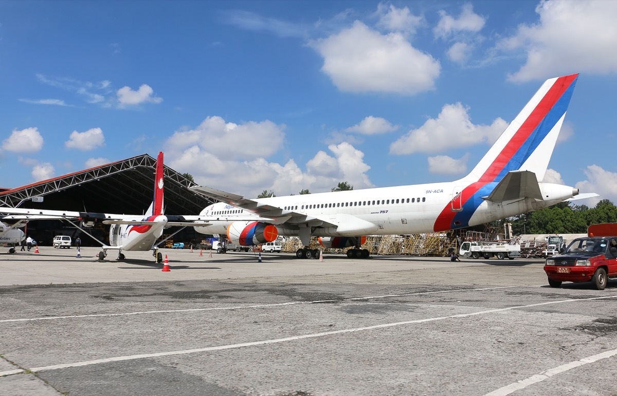 nepal airlines boarding passengers into the plane