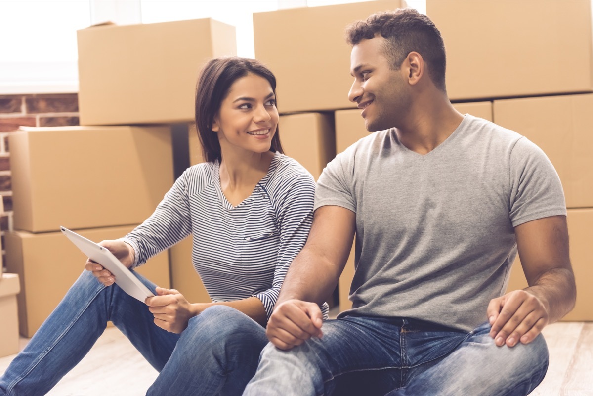 Couple with moving boxes