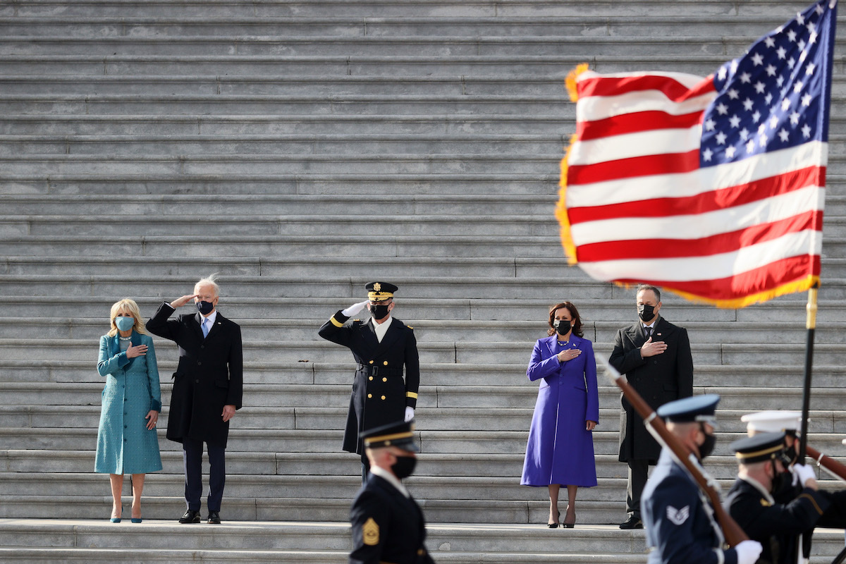 President Joe Biden, first lady Dr. Jill Biden, Vice President Kamala Harris and second gentleman Doug Emhoff attend a Pass in Review ceremony, hosted by the Joint Task Force-National Capital Region on the East Front of the U.S. Capitol after the Presidential Inauguration on January 20, 2021 in Washington, DC.