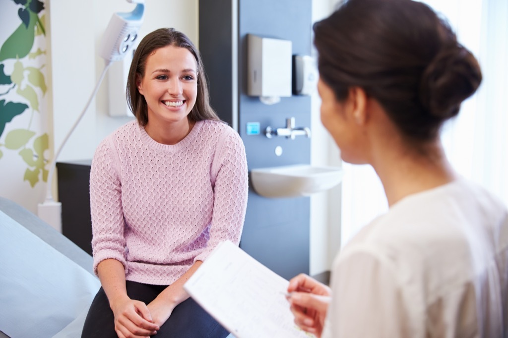 smiling woman at the doctor's office