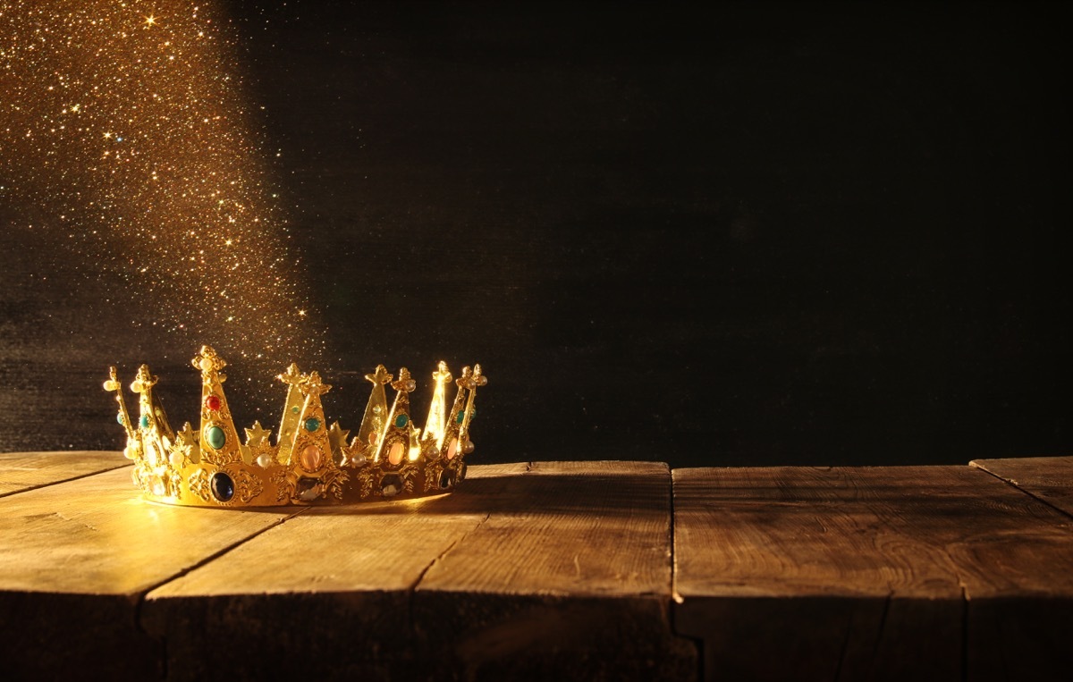 crown on wooden desk