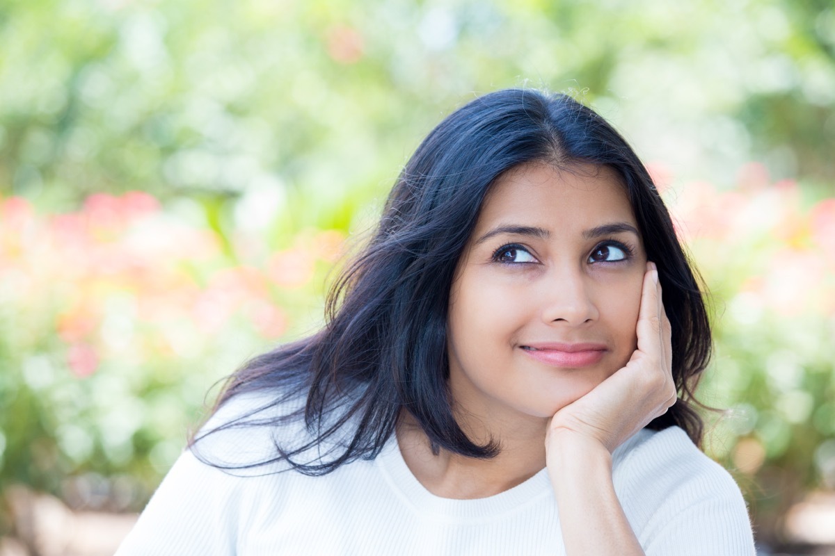 Girl Wistfully Daydreaming