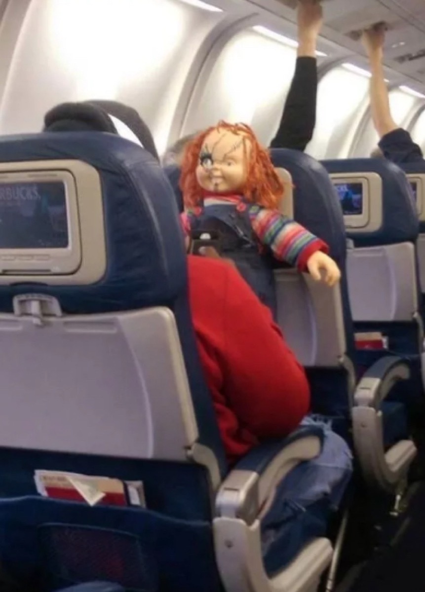 passenger with chucky doll photos of terrible airplane passengers