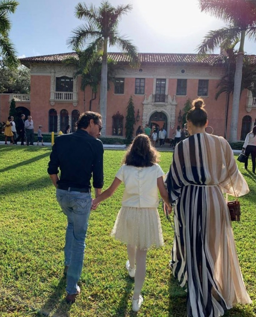 Marc Anthony, Emme, and Jennifer Lopez walking hand-in-hand