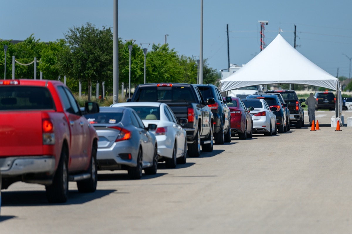 Cars line up at city COVID-19 drive-through testing center