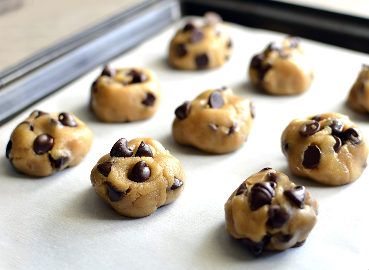 cookie dough balls on a baking sheet