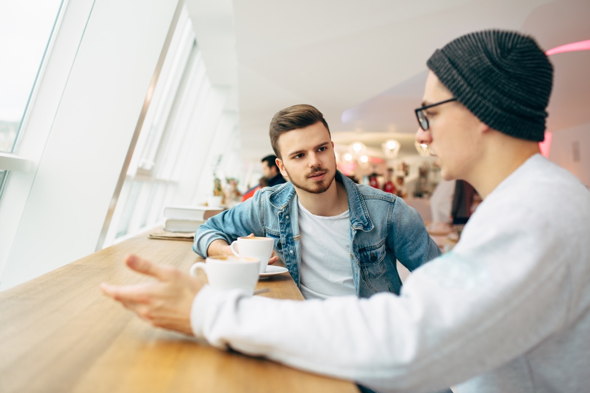 two men having serious conversation