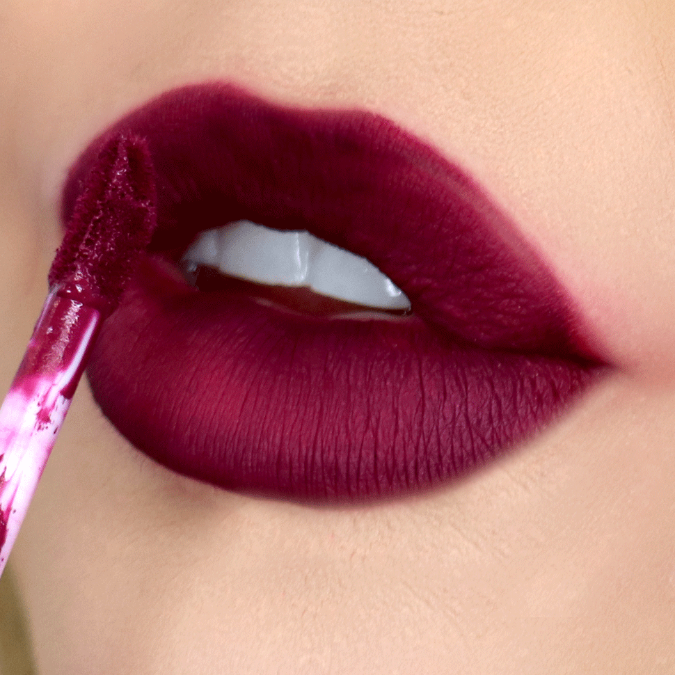 Deep purple lipstick | 10 Lipstick Tricks to Make Your Teeth Look Whiter | Her Beauty