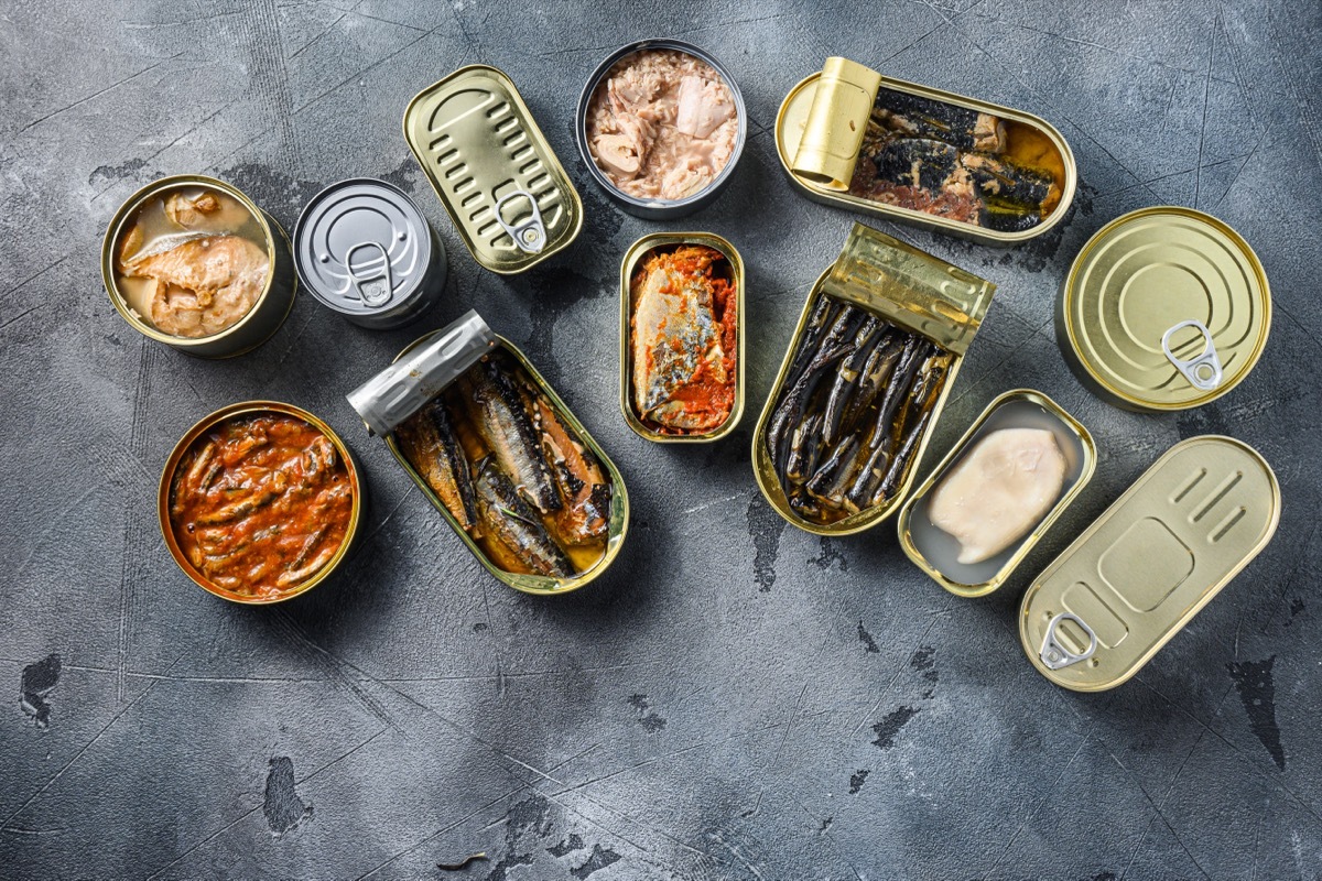 various kinds of fish in metal cans