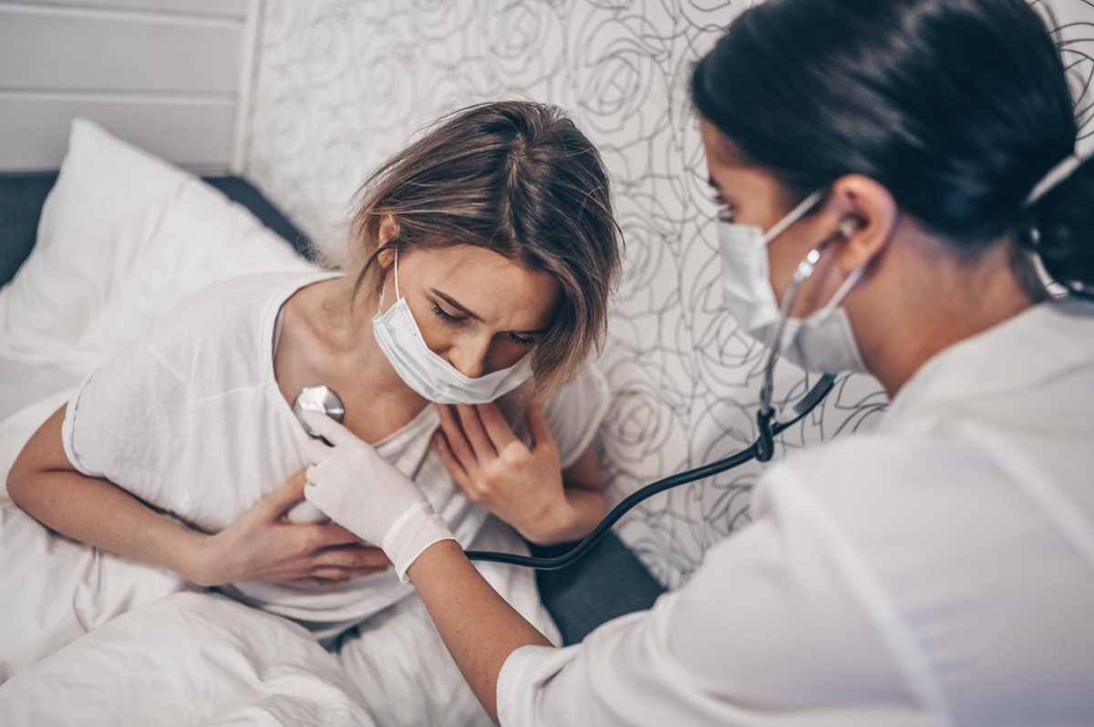 Patient getting care for coronavirus checking breathing