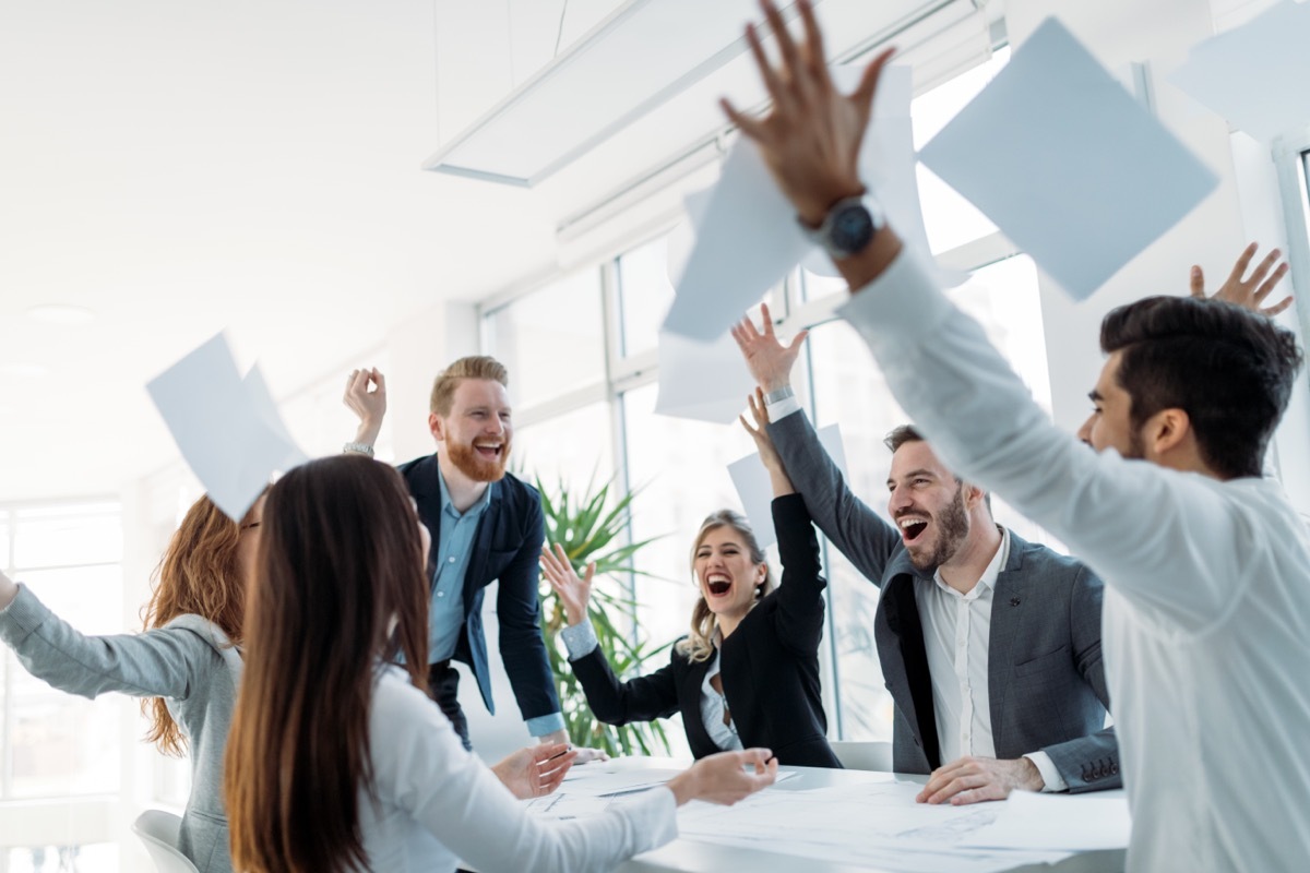 People in Office Celebrating Success