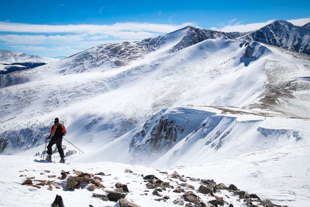 man on top of Breckenridge mountain Peak8