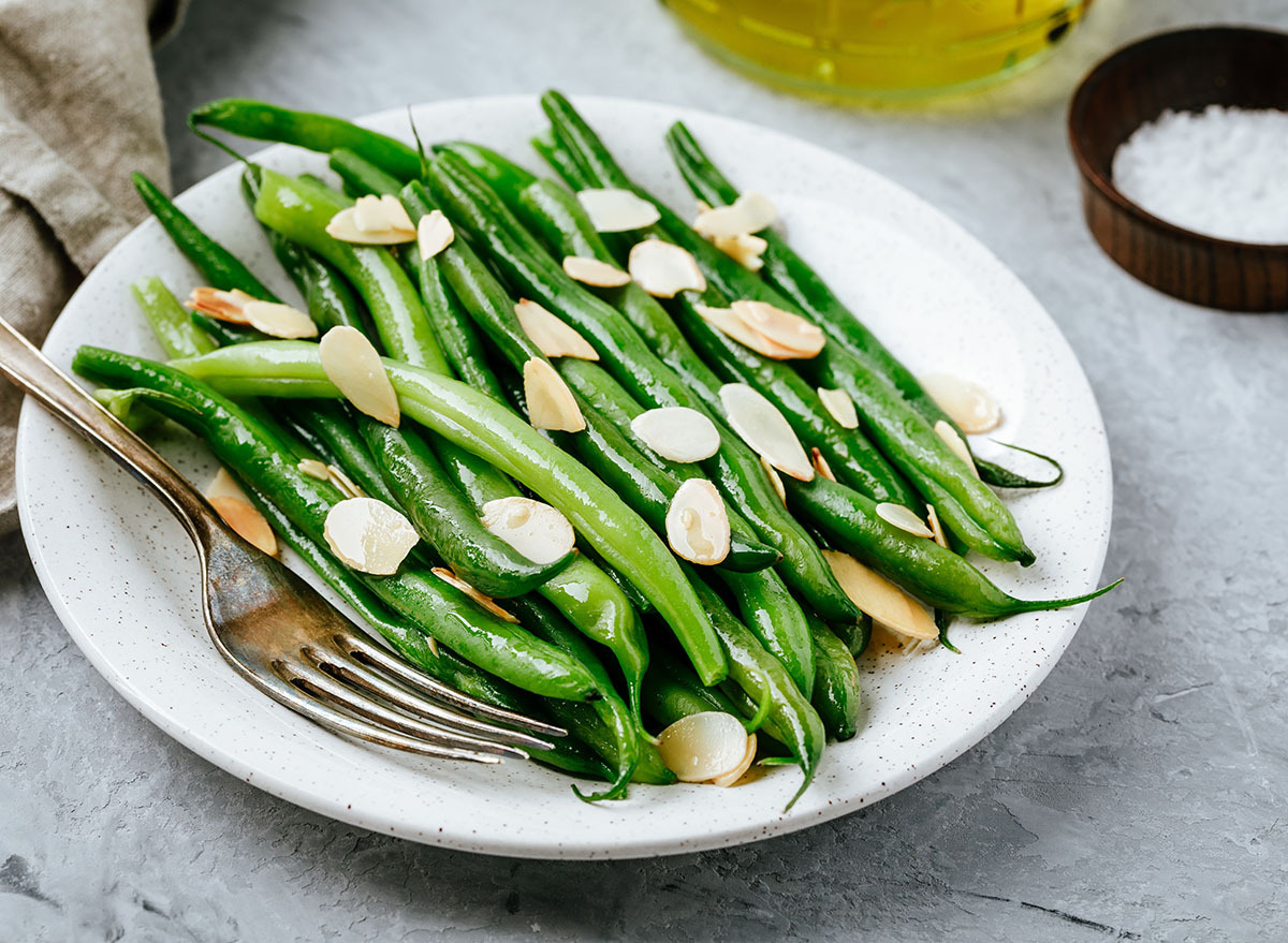 green bean almondine on white plate