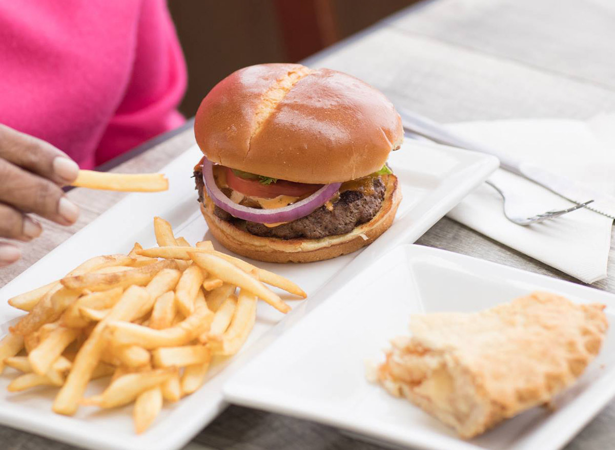 classic burger from perkins on a plate with french fries