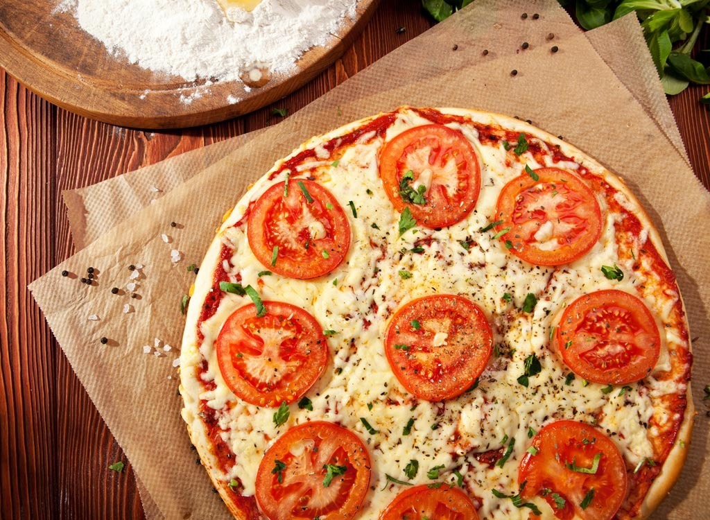 Pizza with tomato slices