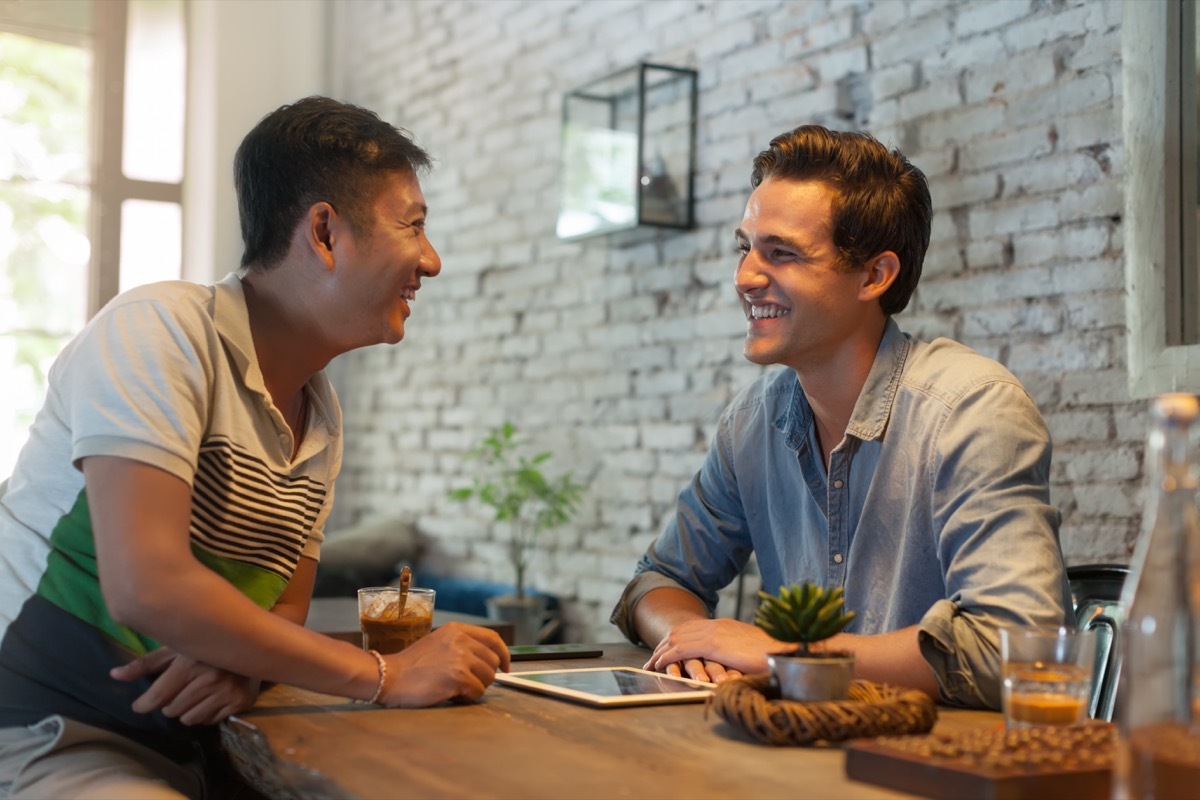 couple on their first date smiling