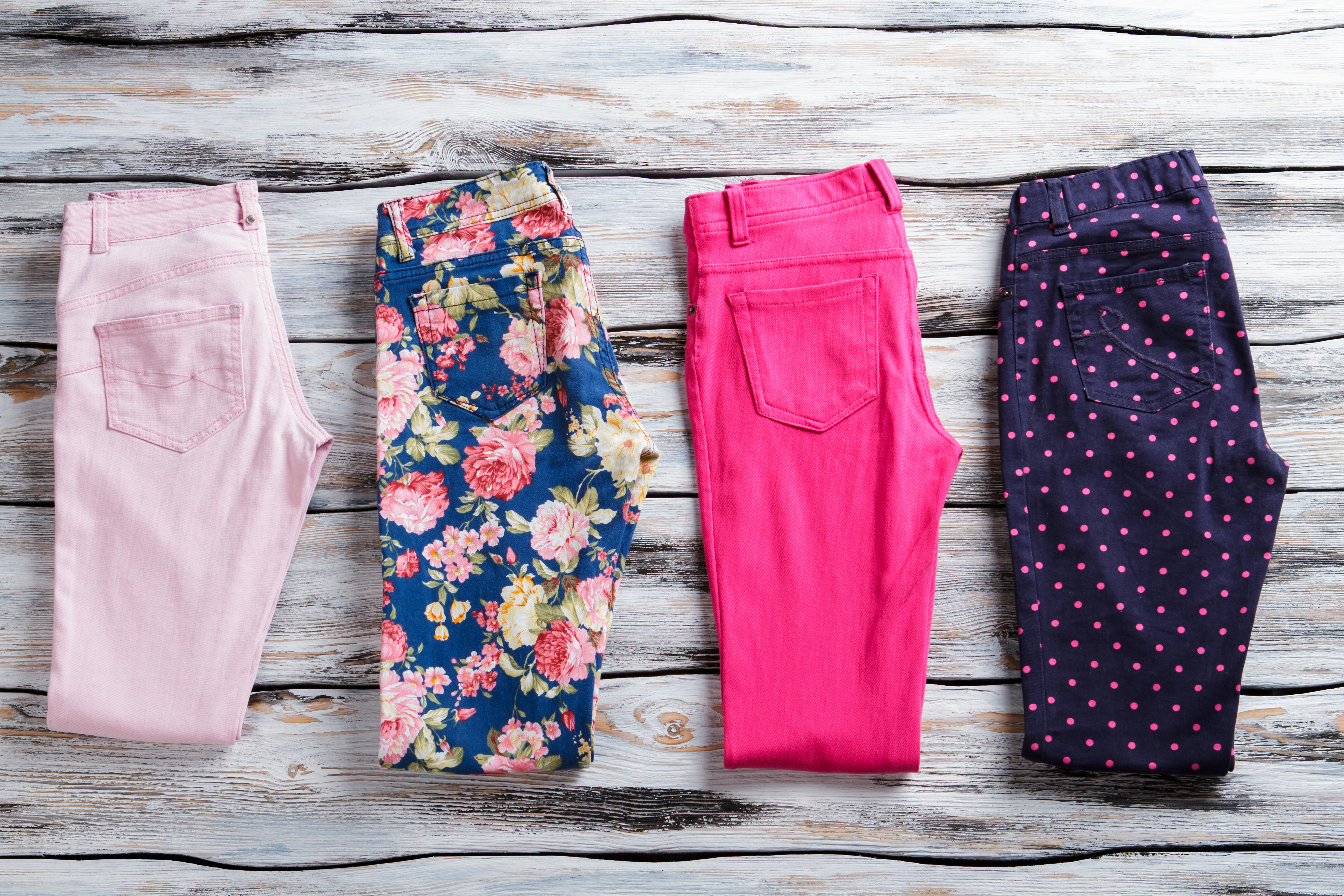 Floral,And,Pink,Folded,Pants.,Woman's,Trousers,Of,Bright,Color.