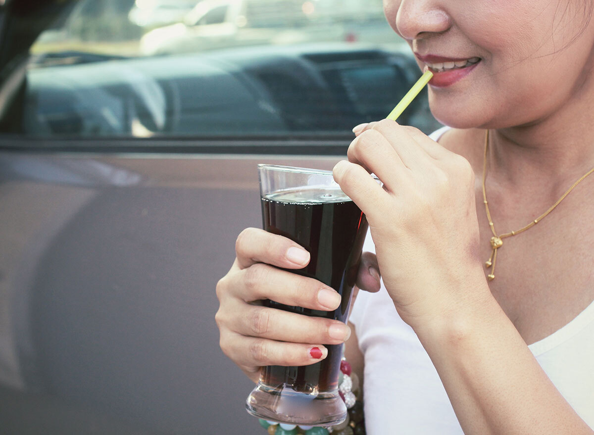 woman drinking soda