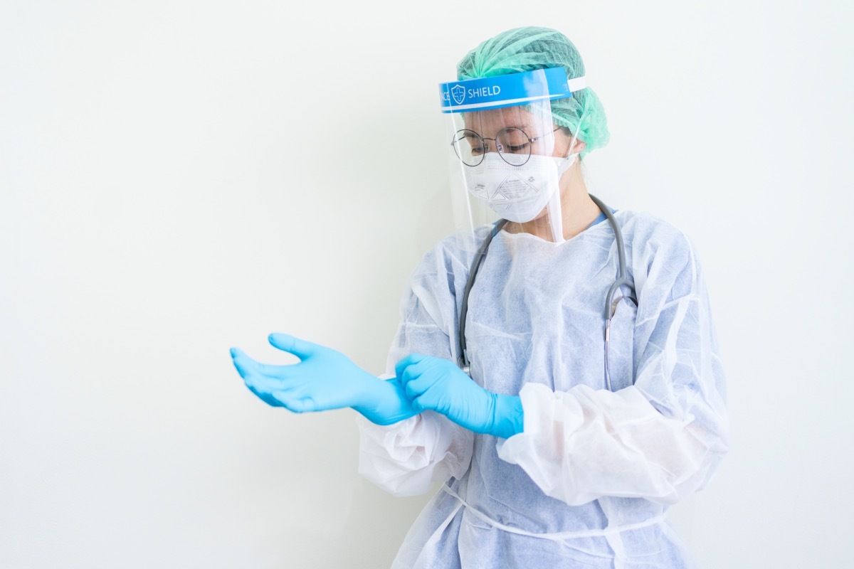 Female coronavirus doctor in face shield