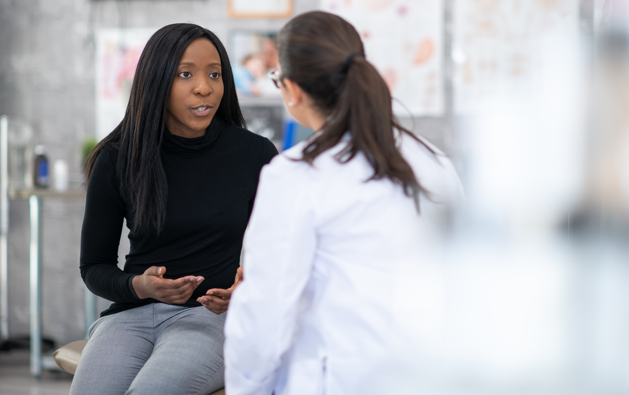 Doctor talking to patient.