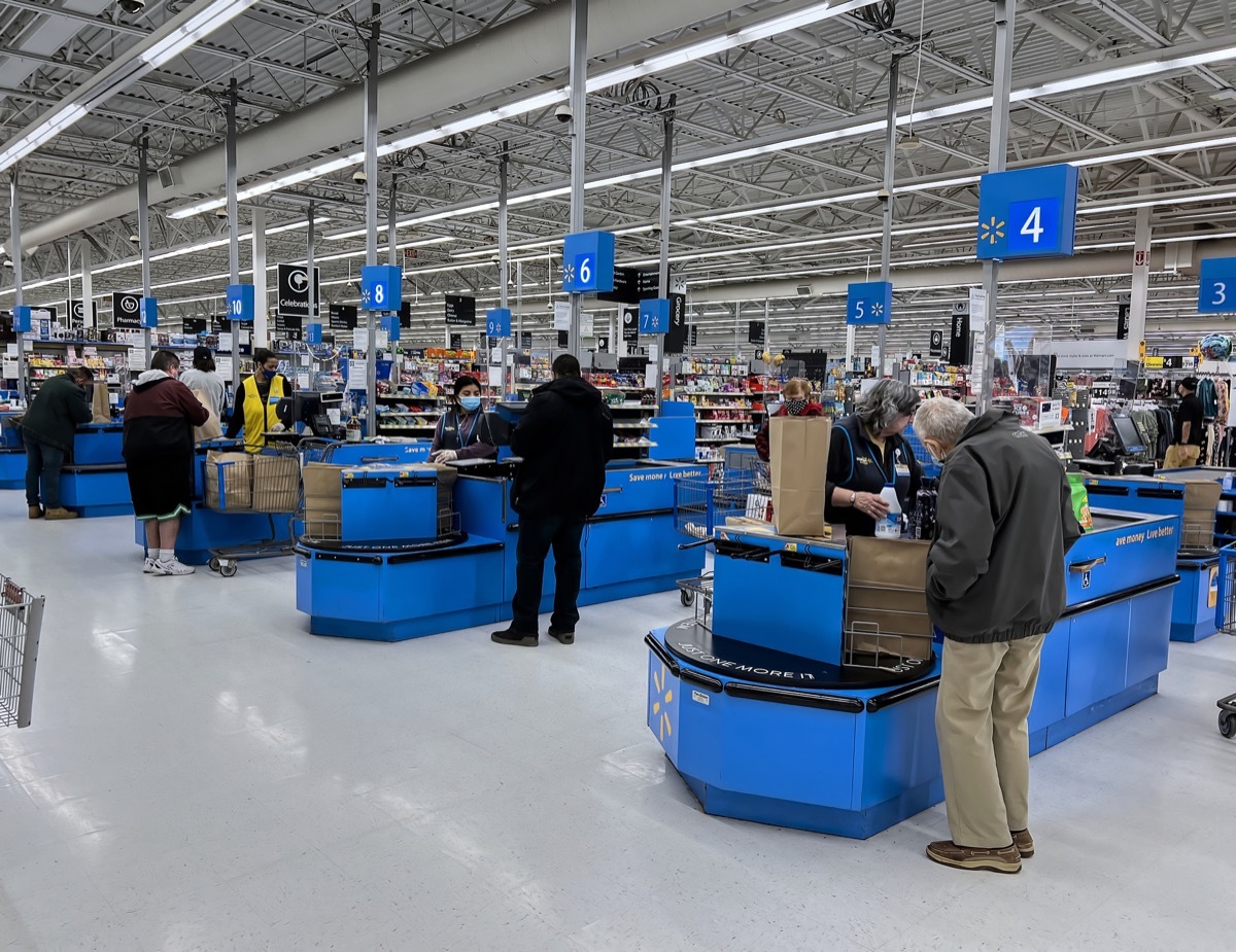 customers checking out at walmart