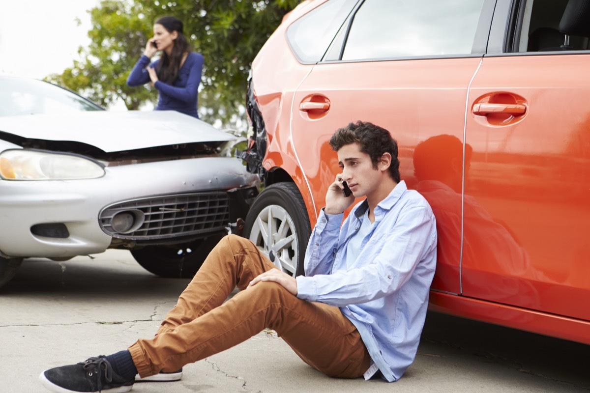 teenage kid calling his mom after getting in a car accident