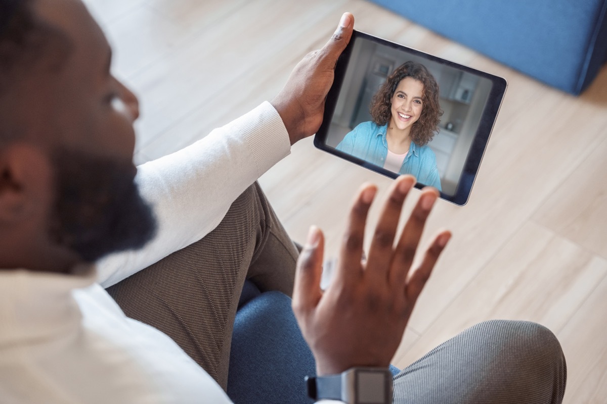 Man meeting woman on tablet