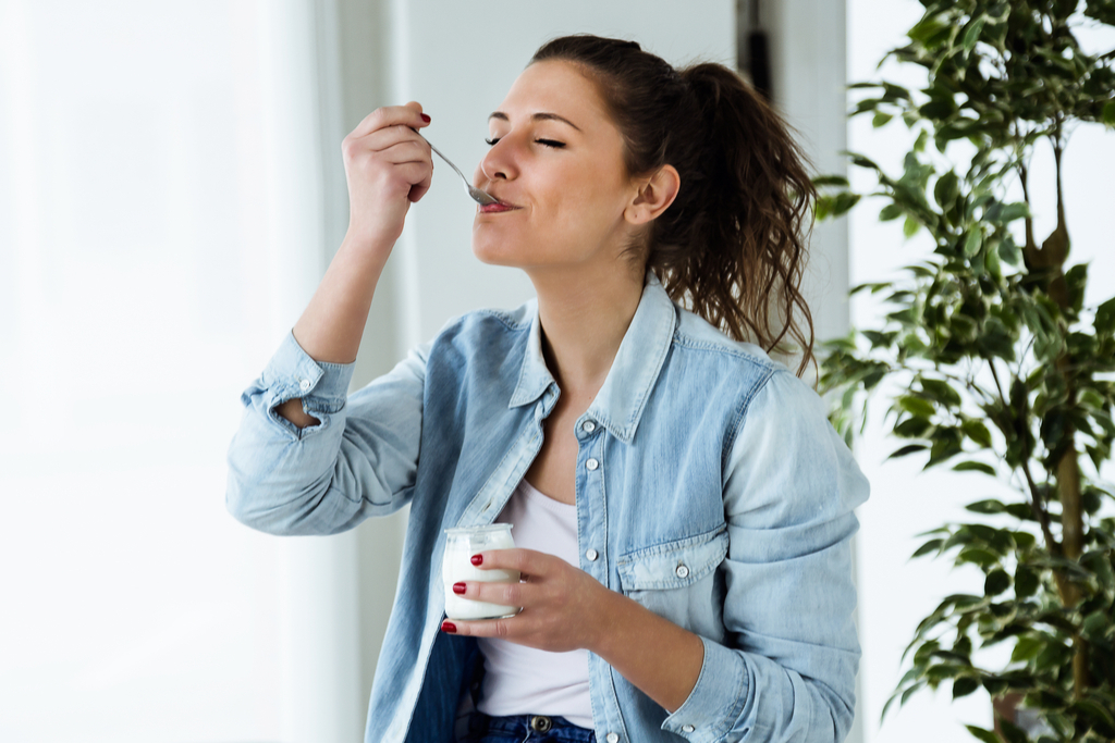 Woman Eating Yogurt Anti-Aging