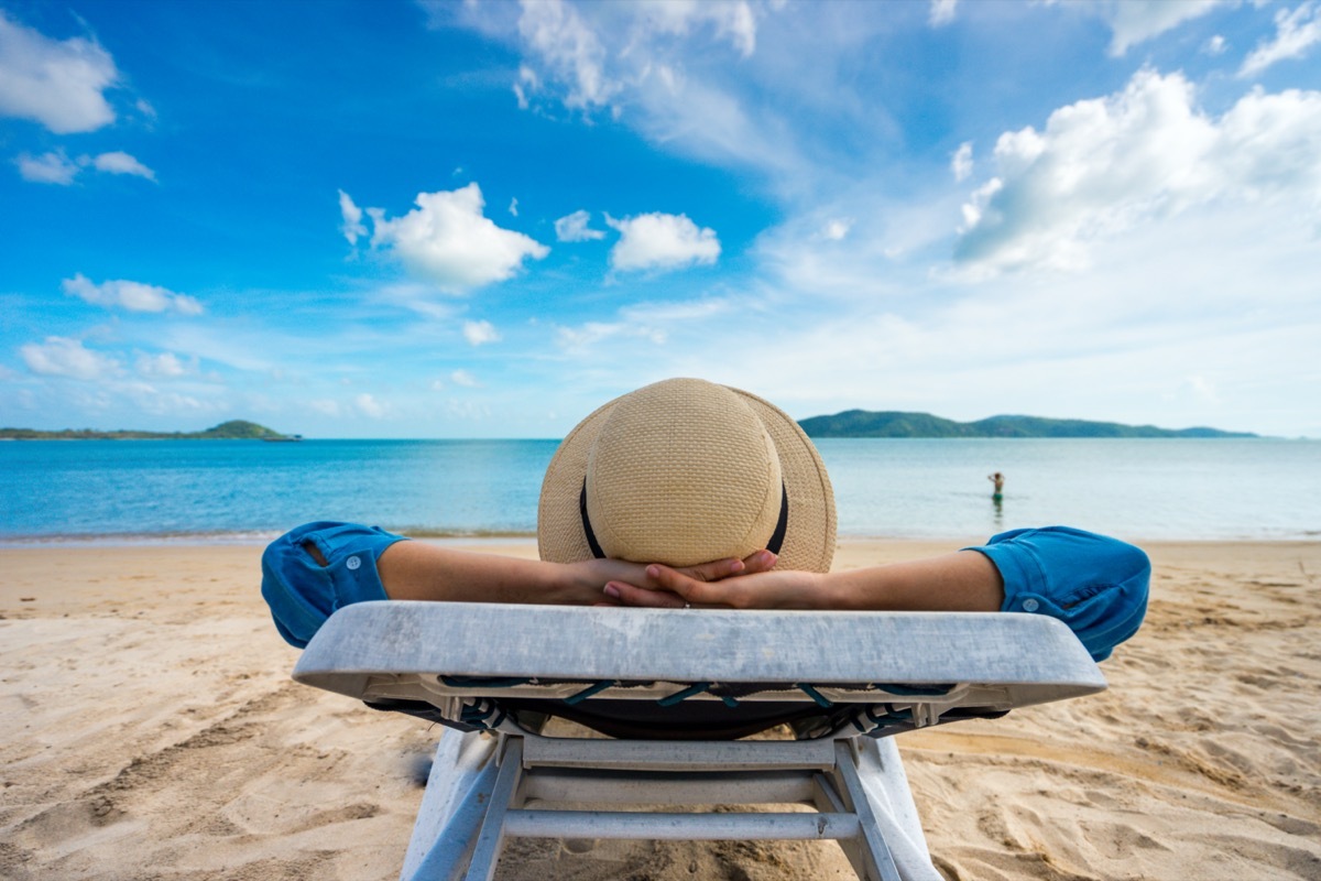 woman relaxing on beach, ocean view, Vacation Outdoors Seascape