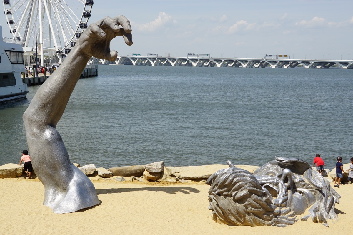 national harbor awakening statue