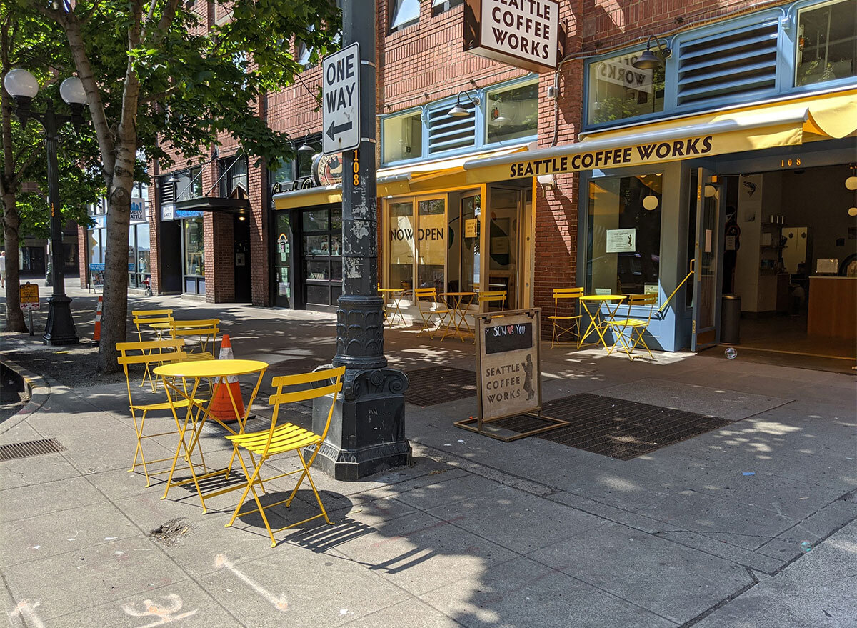 seattle coffee works exterior with outdoor seating