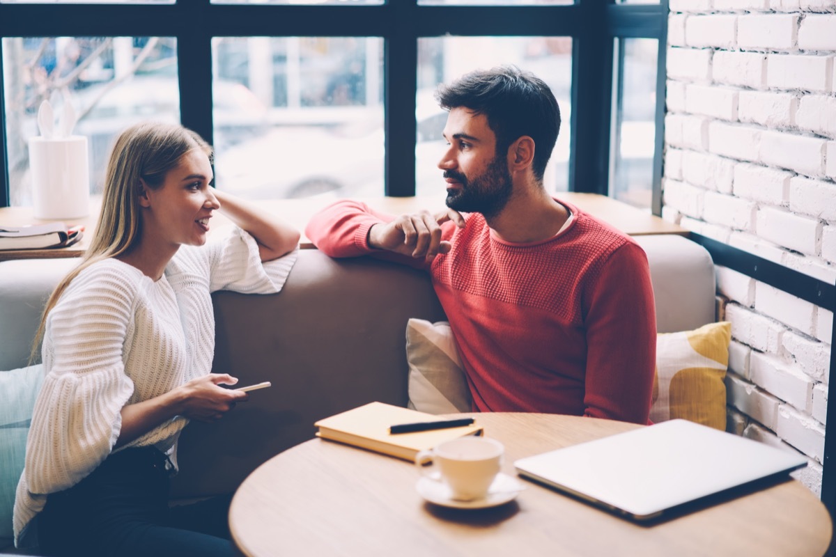 man and woman thinking of fun questions to ask each other during a first date