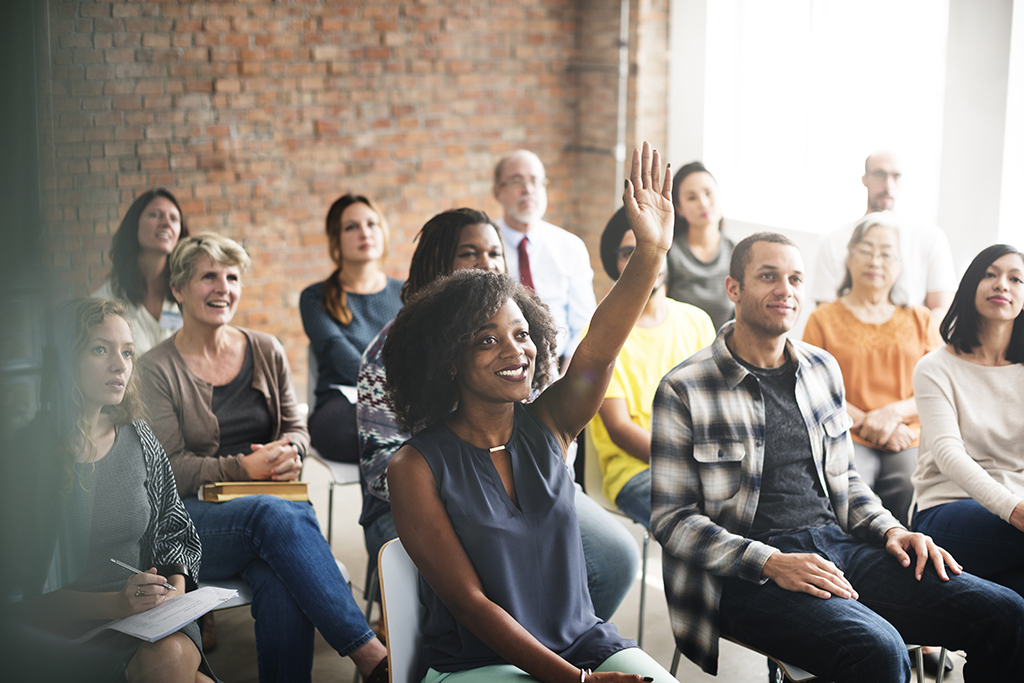 woman asking a question ways to get a promotion after 40