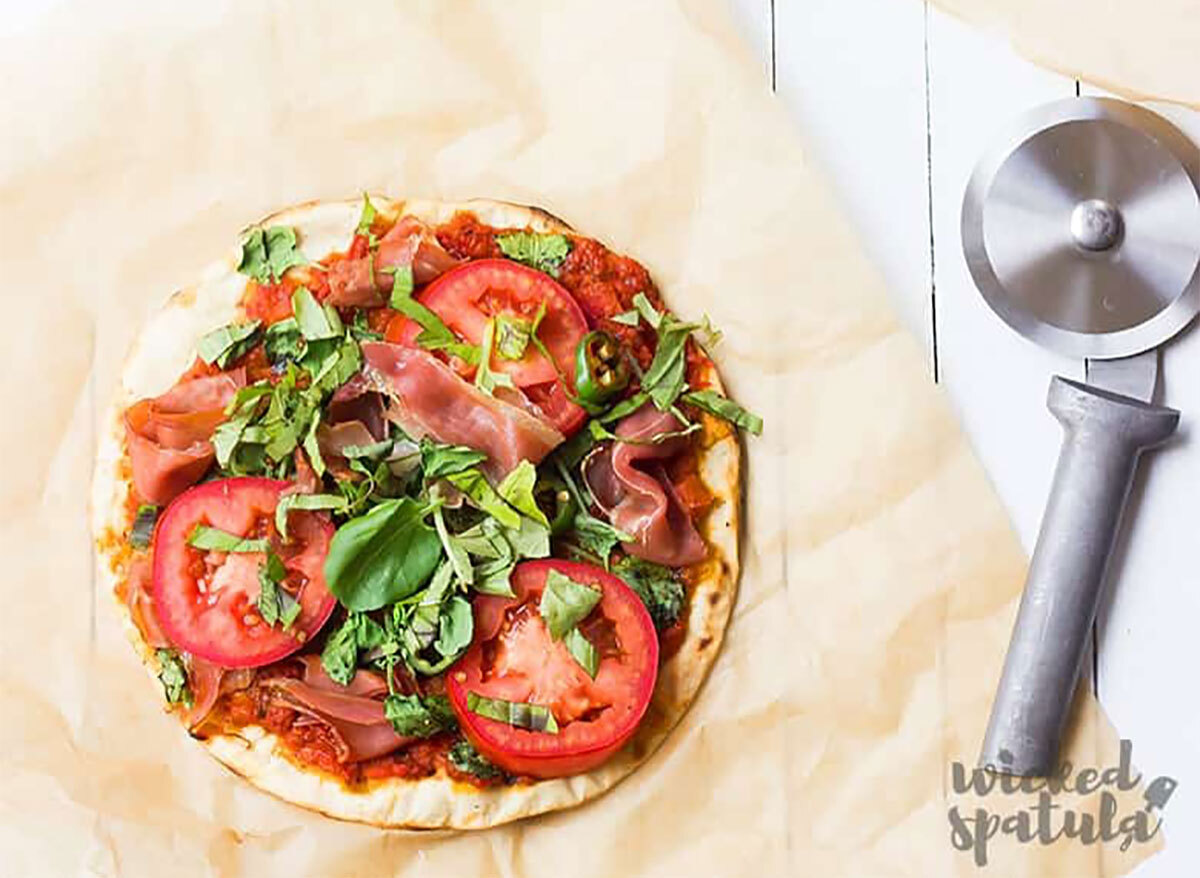 paleo pizza crust with pizza cutter