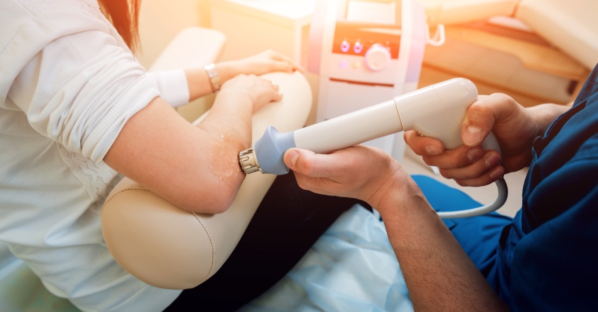 Woman getting cold laser therapy